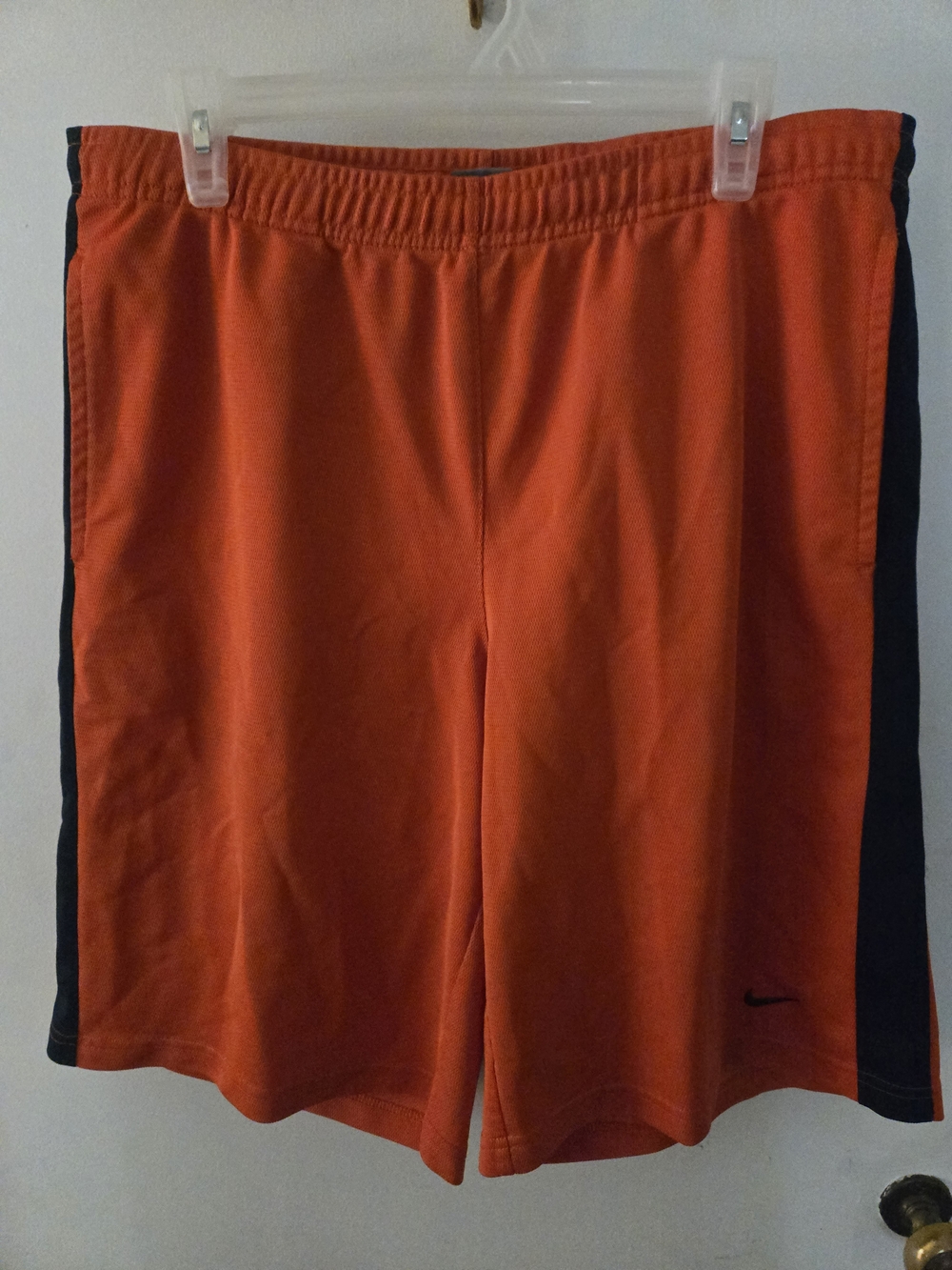 Nike Men’s Orange Athletic Shorts with Black Side Stripes